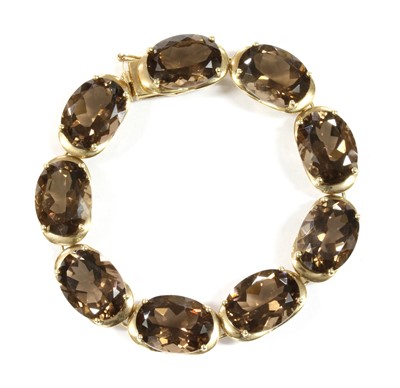 Lot 285 - A 9ct gold smoky quartz bracelet