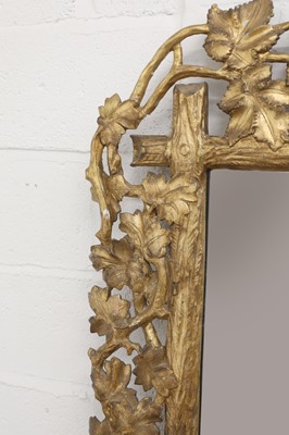 Lot 178 - A large 'faux bois' carved, giltwood gesso wall mirror