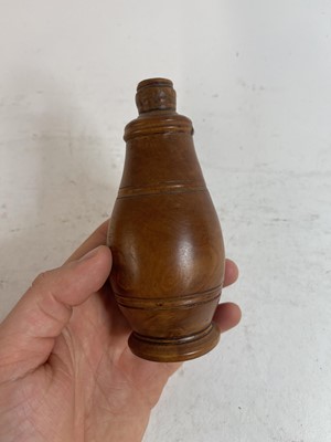 Lot 750 - A collection of eight treen powders and shakers