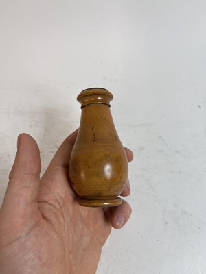 Lot 750 - A collection of eight treen powders and shakers