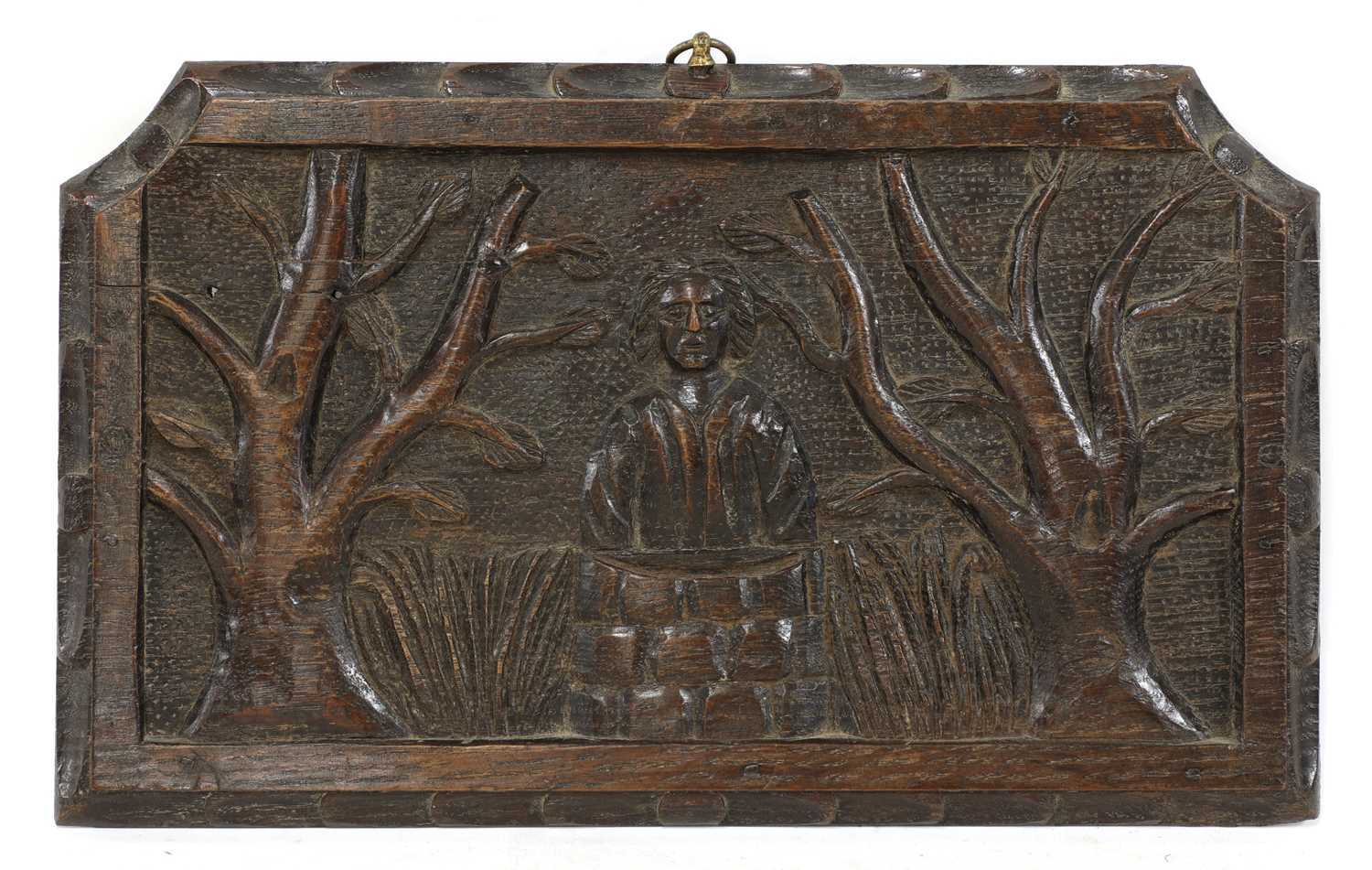 Lot 732 - A primitive carved oak panel