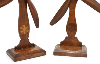 Lot 715 - A pair of carved wooden whirligig mantel ornaments
