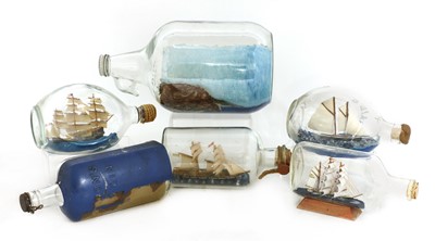 Lot 866 - A collection of six sailorwork ships in bottles