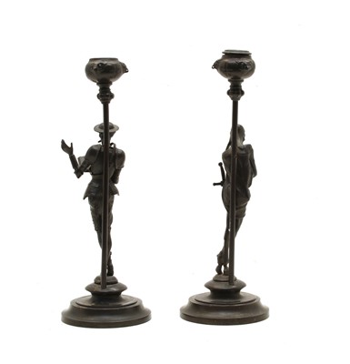 Lot 46 - Two pairs of candlesticks and a lamp base