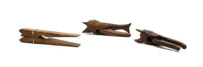 Lot 68 - Three pairs of wooden novelty nut crackers