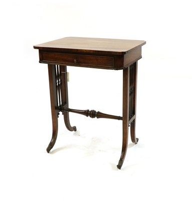 Lot 231 - A George IV rosewood work table in the manner of Gillows
