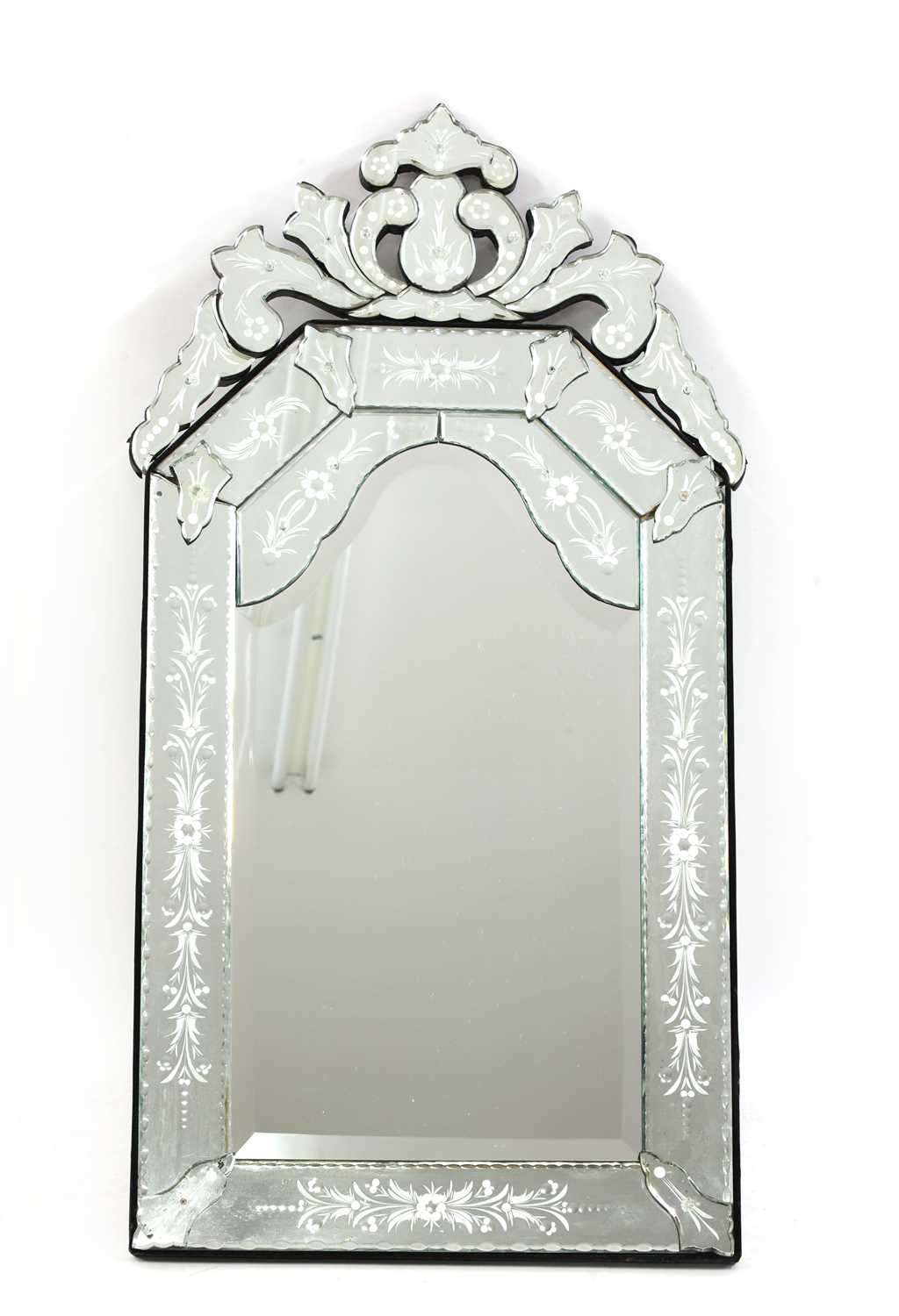 Lot 259 - A Venetian cut and etched glass mirror