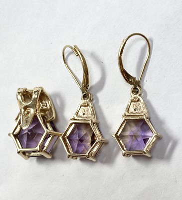Lot 277 - A gold ametrine and diamond pendant and earrings suite