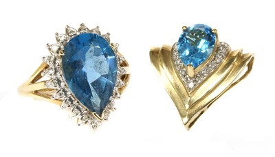 Lot 255 - A 9ct gold blue topaz and diamond cluster ring