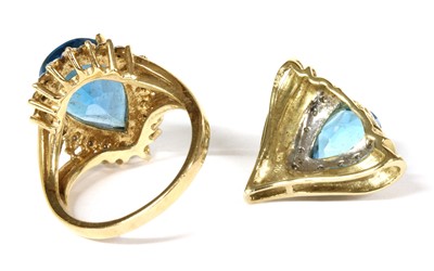 Lot 255 - A 9ct gold blue topaz and diamond cluster ring