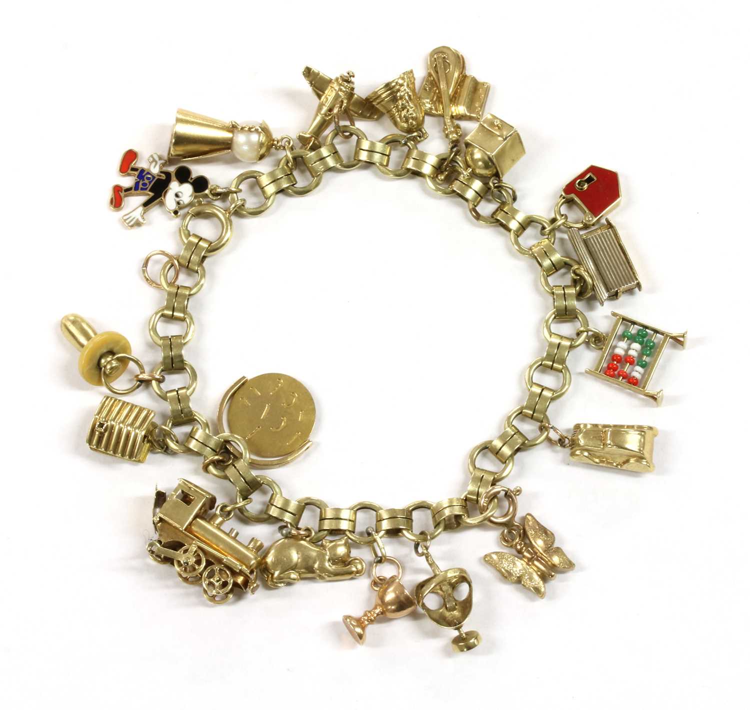 Lot 50 - A Continental gold charm bracelet
