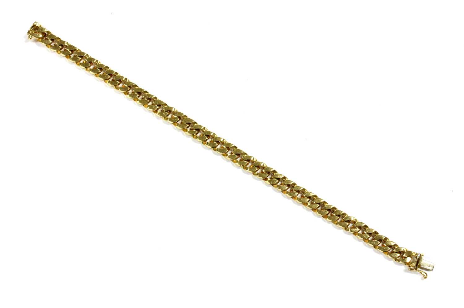 Lot 52 - An 18ct gold curb link bracelet