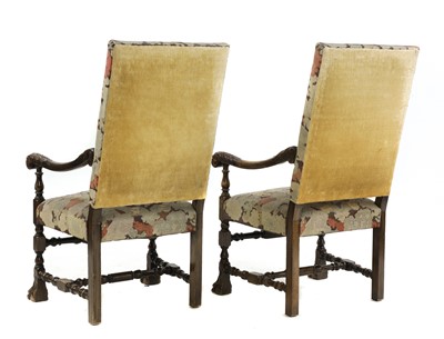 Lot 152 - A pair of Continental stained beech armchairs