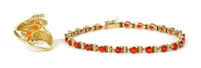 Lot 324 - A 9ct gold fire opal bracelet