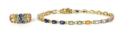 Lot 240 - A 9ct gold varicoloured sapphire bracelet