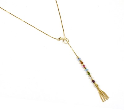 Lot 104 - A gold glass bead lariat necklace