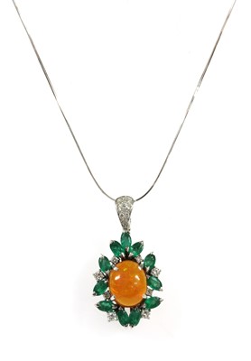 Lot 326 - A white gold fire opal, emerald and diamond pendant