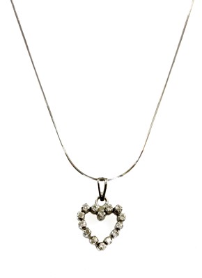 Lot 99 - A white gold diamond set open heart pendant