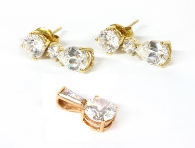 Lot 403 - A pair of gold cubic zirconia drop earrings