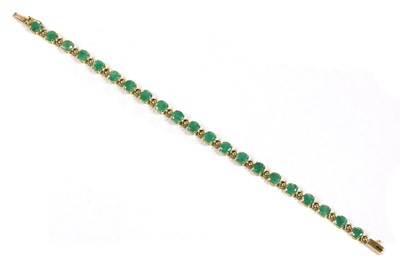 Lot 108 - A 9ct gold emerald bracelet