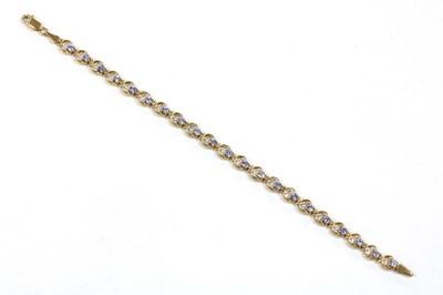 Lot 247 - A 9ct gold tanzanite bracelet