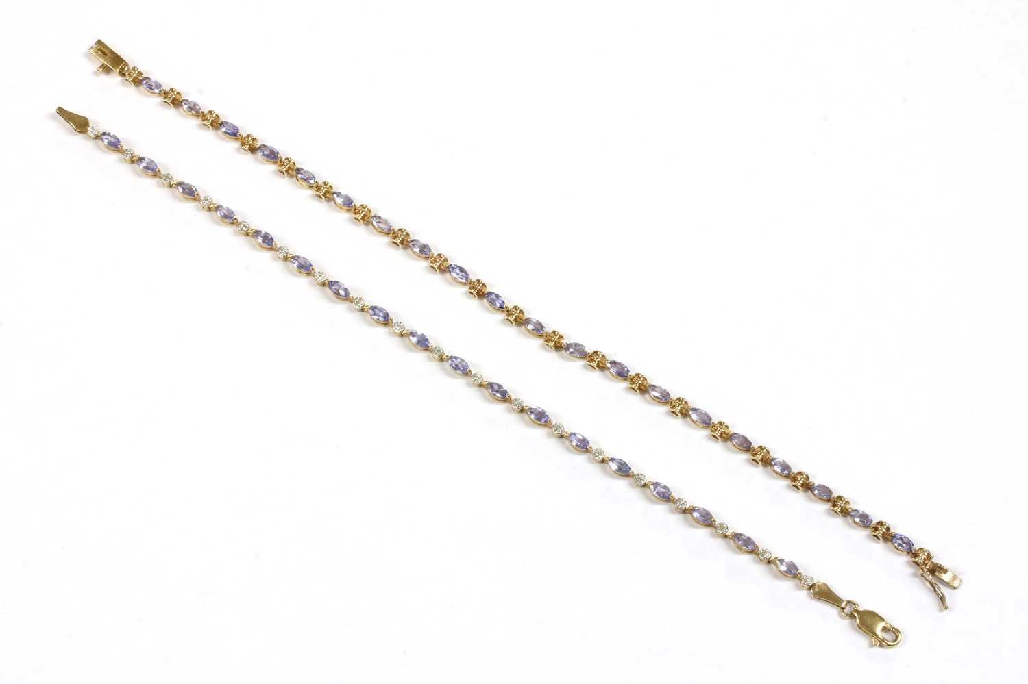 Lot 248 - A 9ct gold tanzanite and diamond bracelet
