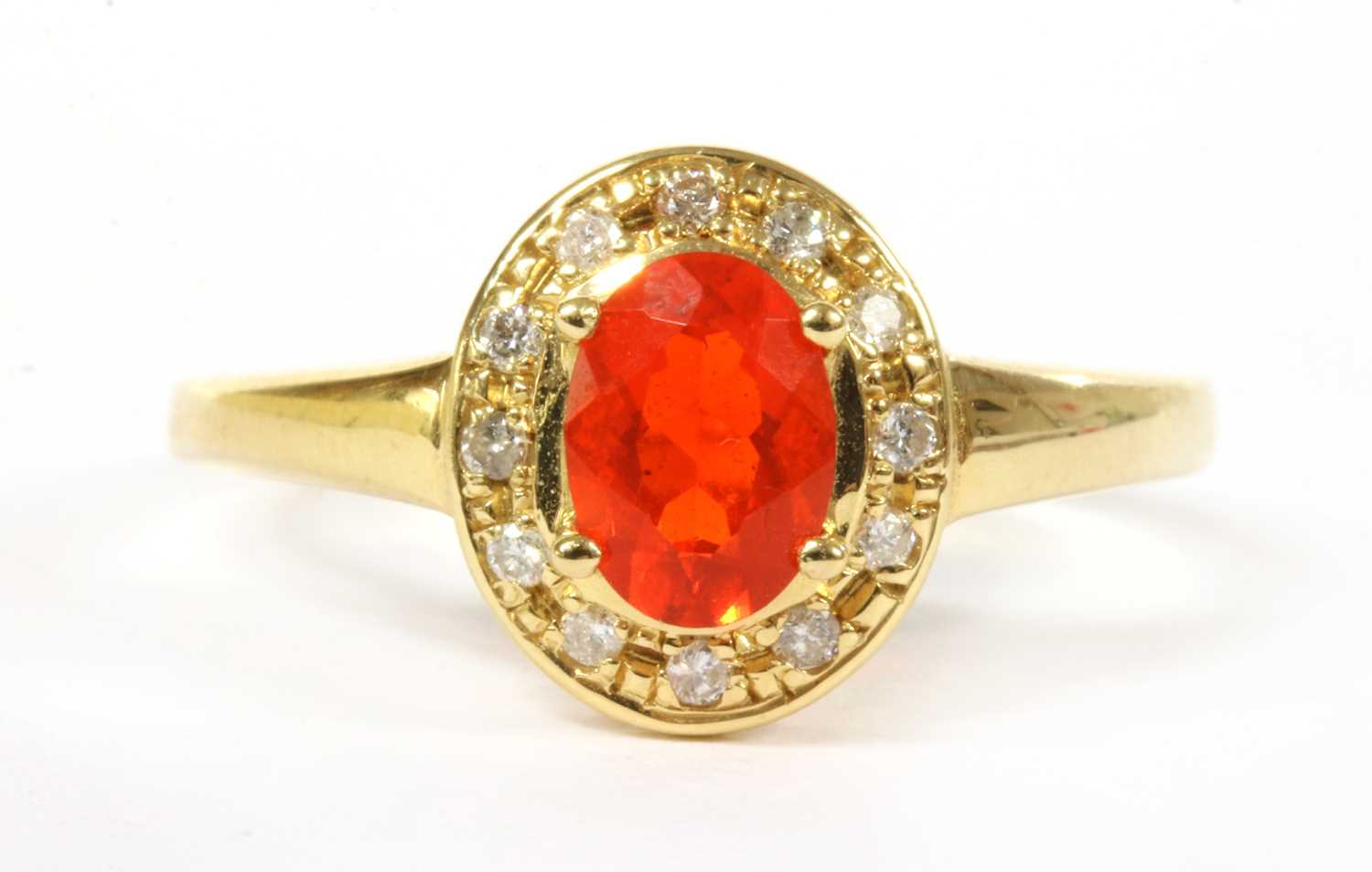 Lot 323 - An 18ct gold fire opal and diamond cluster ring