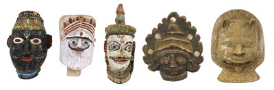 Lot 916 - Four South Asian polychrome painted masks