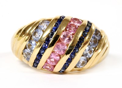 Lot 233 - A 9ct gold varicoloured sapphire bombé ring