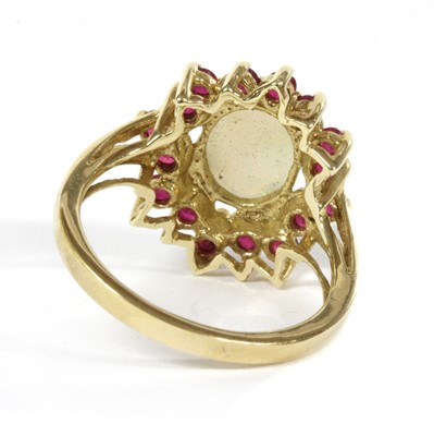 Lot 329 - A 9ct gold opal and ruby cluster ring