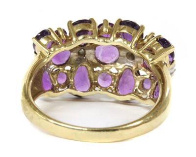 Lot 269 - A 9ct gold three row amethyst and diamond ring