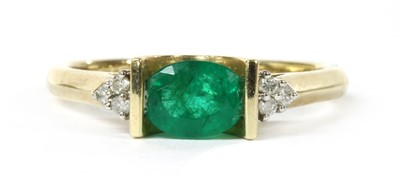 Lot 106 - A 9ct gold emerald and diamond ring