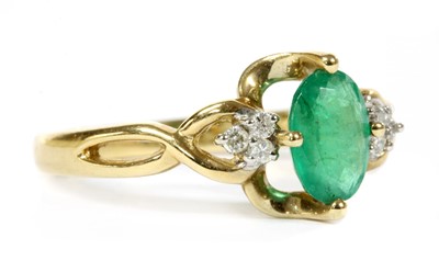 Lot 104 - A 9ct gold emerald and diamond ring
