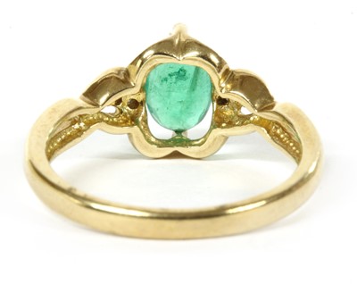 Lot 104 - A 9ct gold emerald and diamond ring