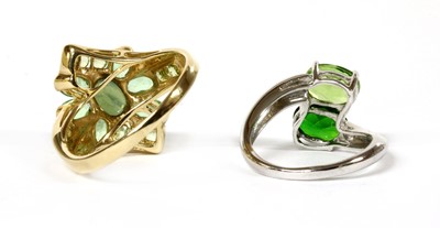 Lot 374 - A 9ct white gold peridot and chrome diopside crossover ring