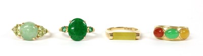 Lot 365 - A 14ct gold three stone jade ring