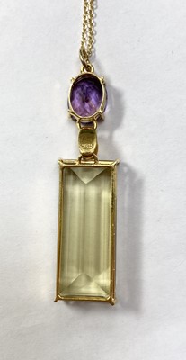 Lot 278 - A gold citrine and amethyst pendant