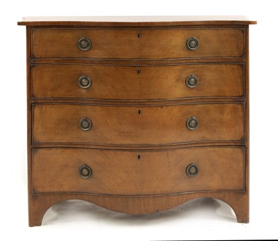 Lot 784 - A George III inlaid mahogany serpentine chest of four graduated drawers