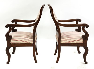Lot 179 - A pair of French Louis Philippe mahogany open armchairs