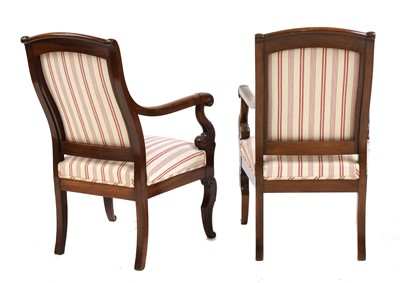 Lot 179 - A pair of French Louis Philippe mahogany open armchairs