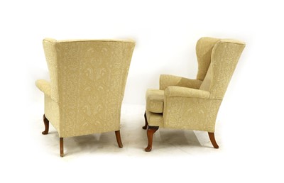 Lot 171 - A pair of Parker Knoll wingback armchairs