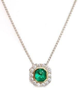 Lot 465 - A two colour gold emerald and diamond octagonal cluster pendant