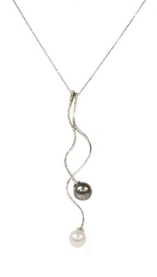Lot 206 - An 18ct white gold cultured pearl and diamond pendant