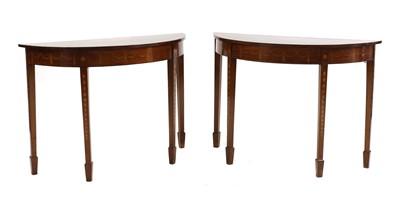 Lot 316 - A pair of George III inlaid mahogany demilune console tables