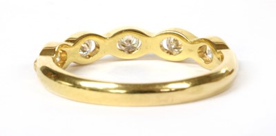 Lot 158 - An 18ct gold diamond half eternity ring