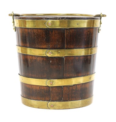 Lot 106 - A George III mahogany and brass bound peat bucket