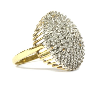 Lot 166 - An 18ct gold seven tier diamond set cluster ring