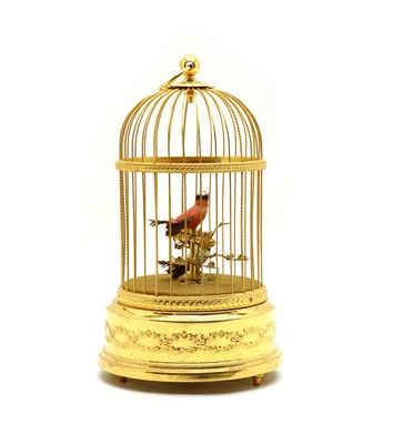 Lot 101 - A modern gilt singing birdcage music box
