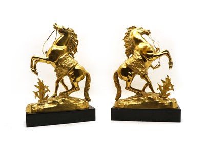 Lot 157 - A pair of polished bronze Marley horses