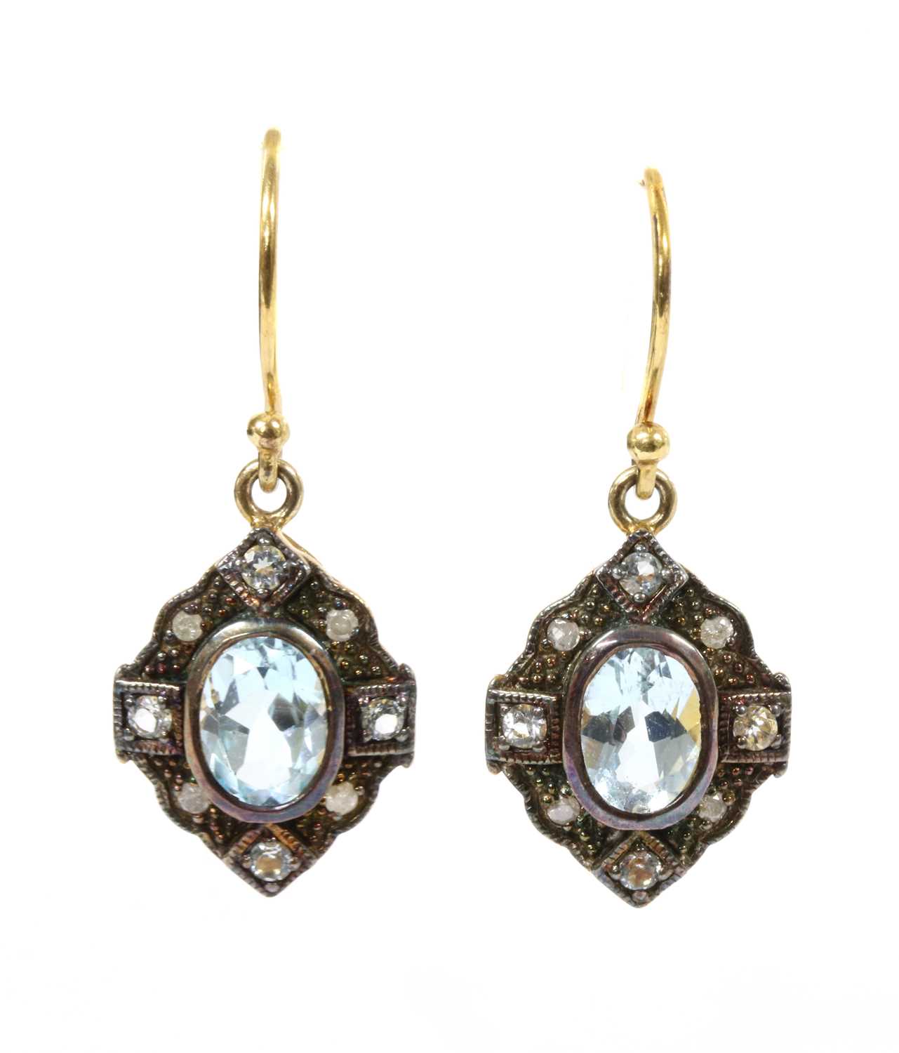Lot 260 - A pair of silver and gold, blue topaz and diamond drop earrings